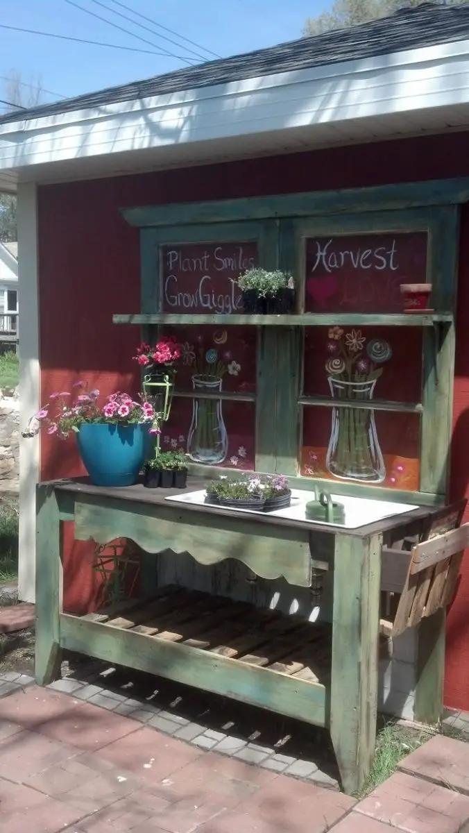 Turn an old wood door into a potting bench DIY projects 