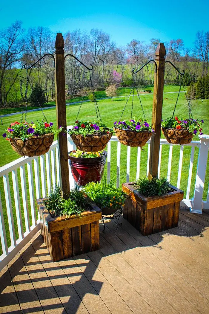 Decorate your patio with pretty flowers in a hanging basket planter