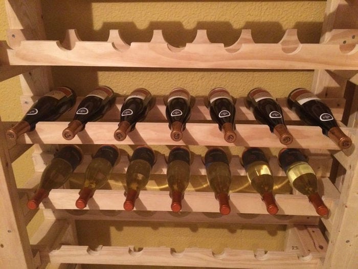 Using a wine rack is a safe and convenient way to store bottles of wine.