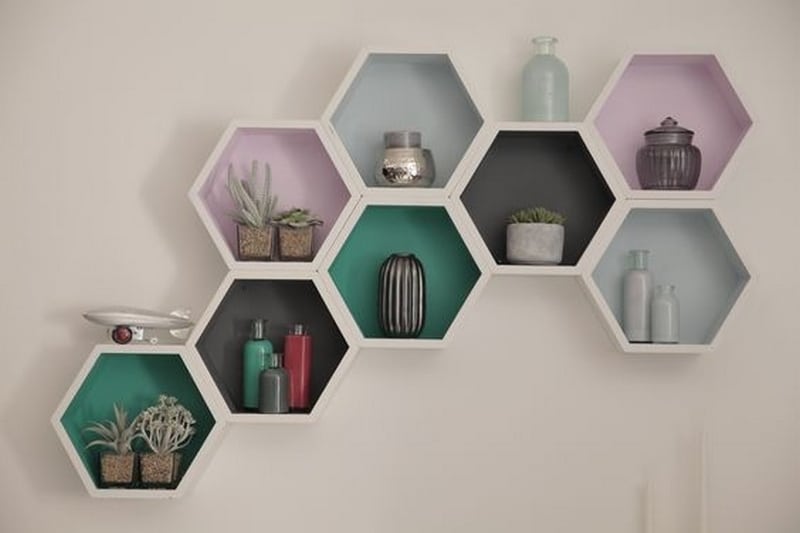 These DIY honeycomb shelves can double as wall art.