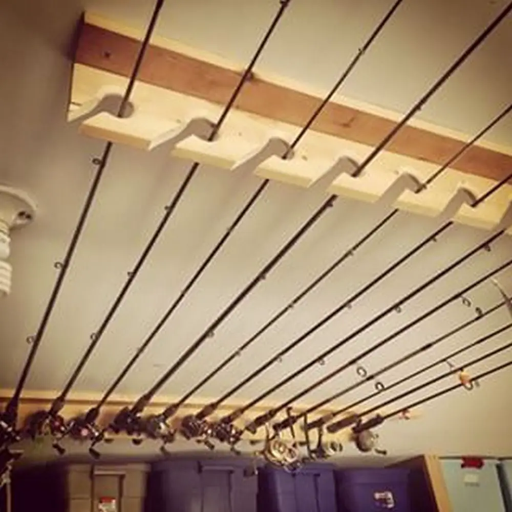 Ceiling mounted fishing pole rack. Instead of storing your fishing pol