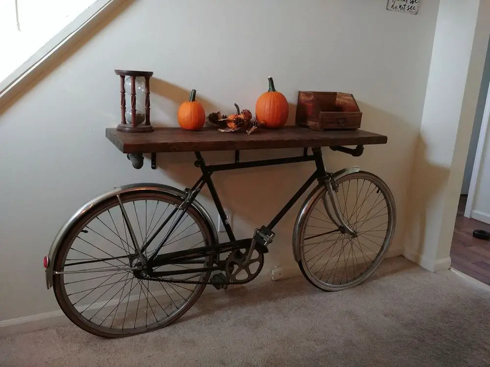 This DIY bike entry table is a rustic and charming welcome treat for your guests.