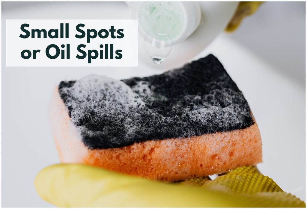 Using a powerful detergent, along with a scrub brush and sponge, can often effectively eliminate oil stains from cement.