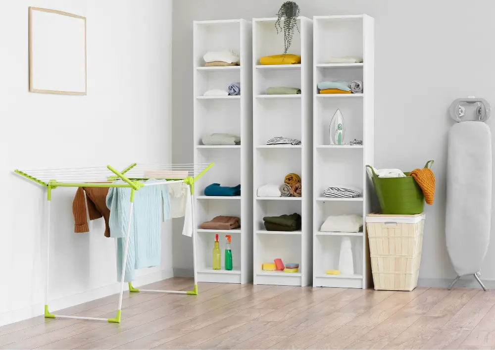 Install overhead cabinets above your appliances for storing items like extra towels, cleaning supplies, and other laundry accessories.Pipe Shelving:Achieve an industrial look with pipe shelving.