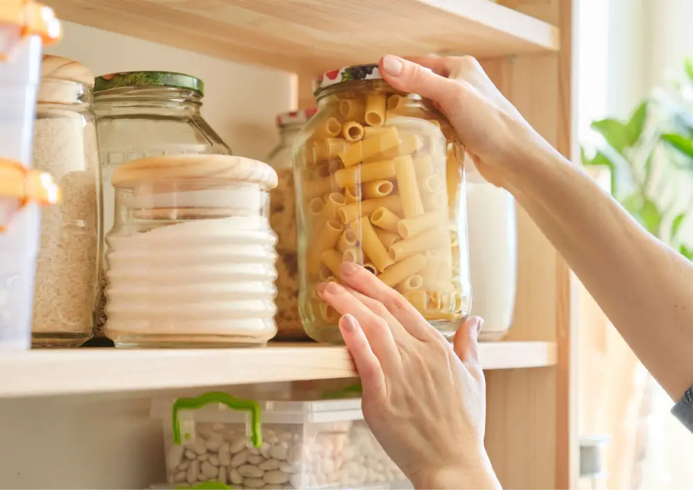 Storing rarely used items or seasonal goods in the upper shelve of your pantry shelf.