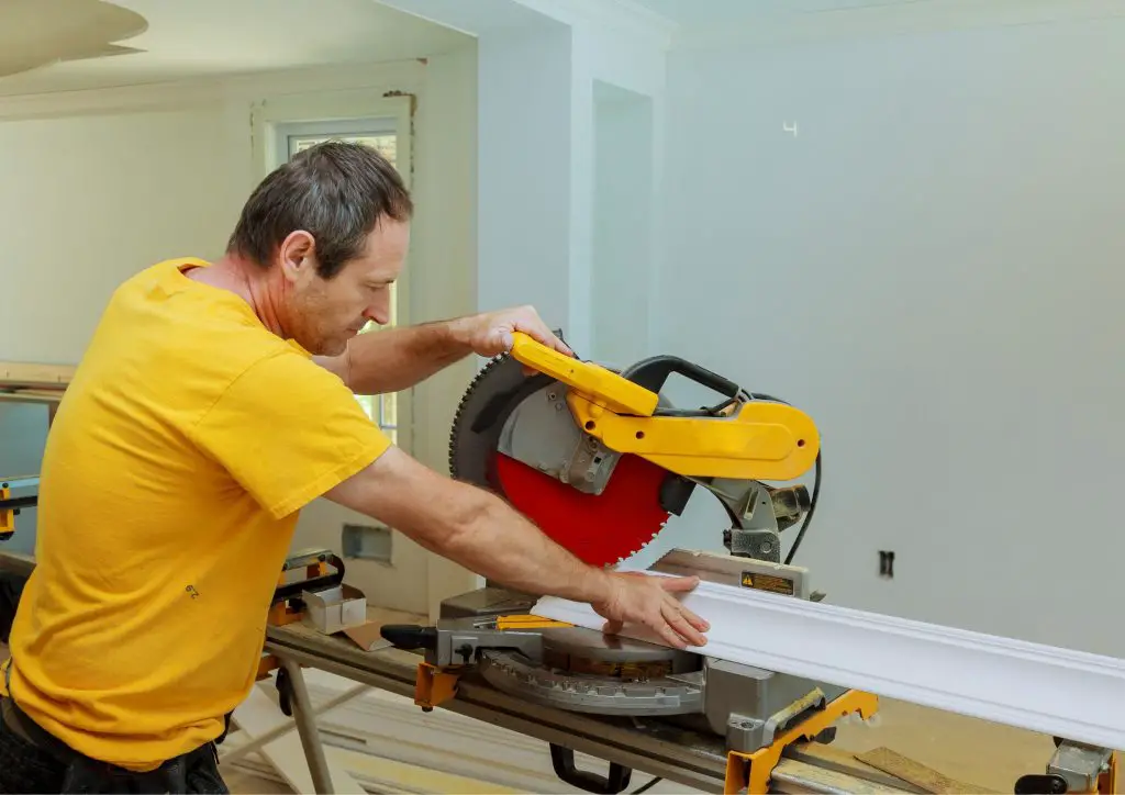 cutting wooden molding using a miter saw