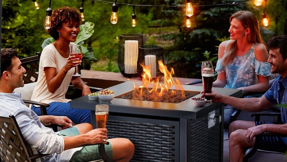 An image of people around a propane fire pit.