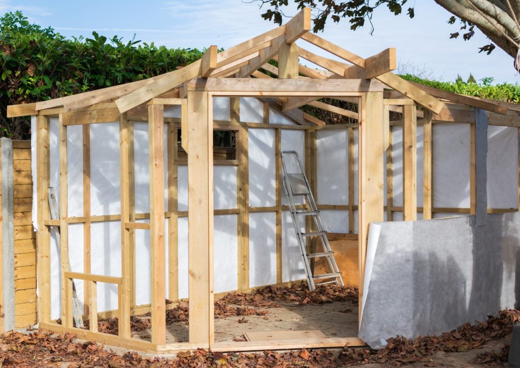 Building a sturdy frame is essential for a solid DIY garden shed. 