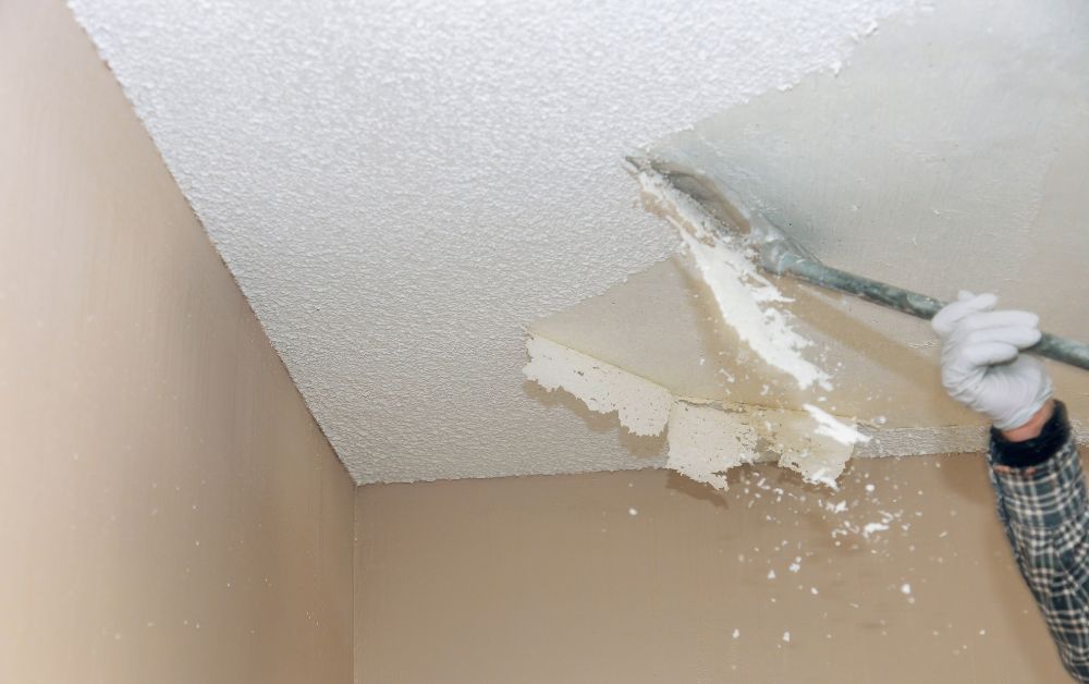 An image of a removal service for an article about how to remove popcorn ceiling.